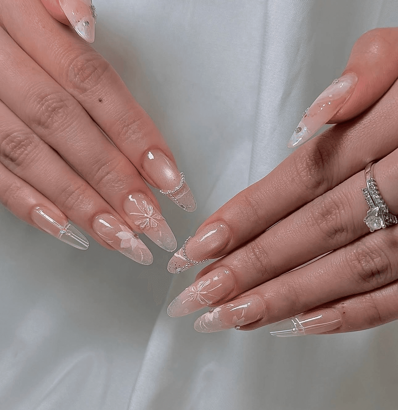 Soft floral crystal nail art by JOVIAL BEAUTY