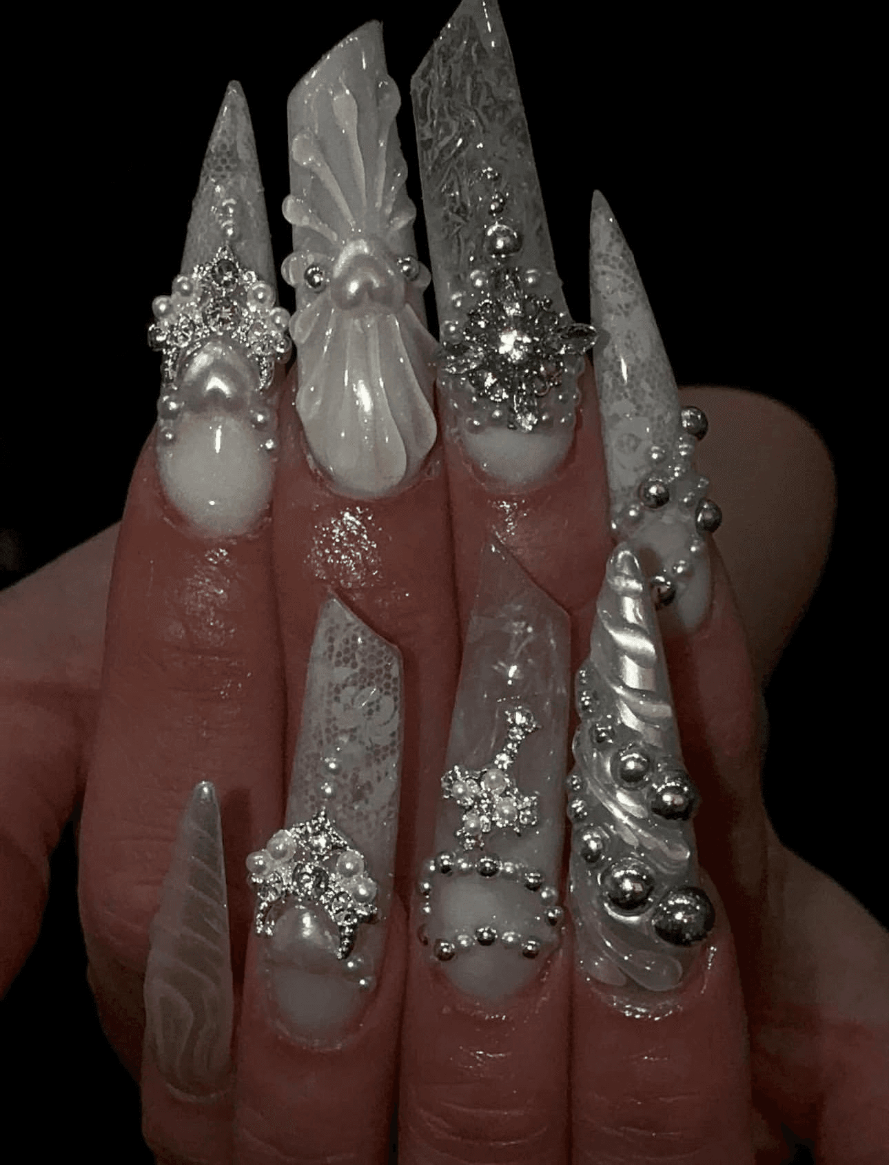 White glam nail art with pearls and rhinestones
